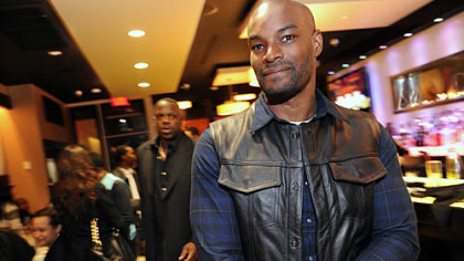 Model Tyson Beckford arrives at Savoy Friday night.
