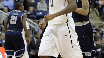 Dante Taylor celebrates near the end of Pitt's upset of No. 9 Georgetown Saturday at Petersen Events Center - the Panthers' second win in a row.