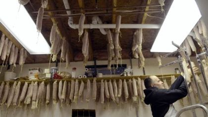 Sopressata is hung to dry in the Panellas' Prospect basement.