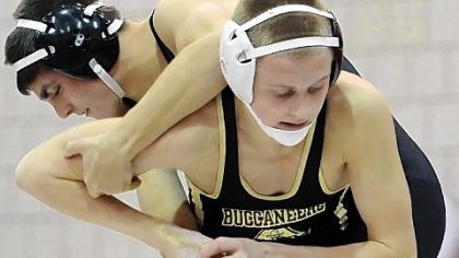 South Side Beaver's Nathan Reckner, top, wrestles Chartiers-Houston's Pete Provenzano in the 126-pound weight class of the WPIAL Section 1 Wrestling Team Championships Jan. 25 at Freedom Area High School.