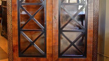 Accented glass door cabinet by Bennett Galleries