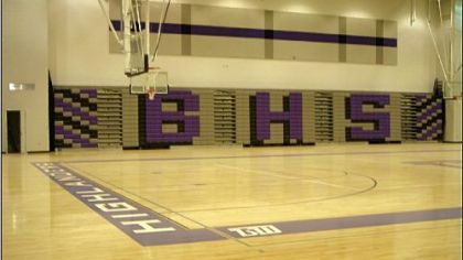 The renovated gym is part of a new physical education complex that has a gymnasium, swimming pool, indoor track, fitness center and locker rooms.