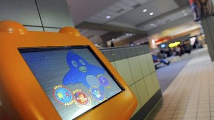 A gaming kiosk created by Electric Owl Studios is located in the baggage claim area of the Pittsburgh International Airport.