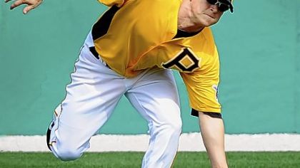 Nate McLouth makes a catch at Pirates spring training Sunday in Bradenton, Fla.