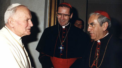 Anthony Joseph Bevilacqua, archbishop of Philadelphia, right, greets Pope John Paul II in July 1991.
