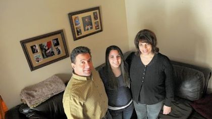 Nina Pugliese, 17, with her parents, Anthony and Francine, at their home in Jefferson Hills. Nina has been diagnosed with postural orthostatic tachycardia syndrome, or POTS.