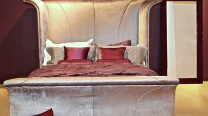 Velvet bed and pillows from the Priscilla Presley Home Collection.