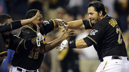 Pirates catcher Rod Barajas is congratulated at home plate after hitting a two-run walk off home run against the Nationals in the ninth inning Tuesday night at PNC Park.