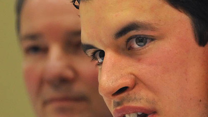 Sidney Crosby talks about his injury Tuesday, with Penguins' general manager Ray Shero behind him at Consol Energy Center.