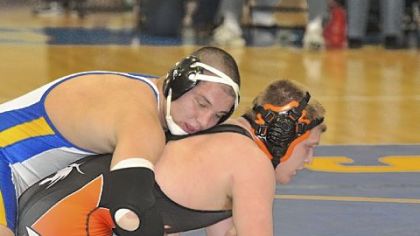 Hampton High School's Jacob Hart, left, goes against Greater Latrobe's Scott Mohring in the 195-pound match at the Powerade Tournament this past Friday at Canon-McMillan High School. Hart won the match by decision, 7-5.