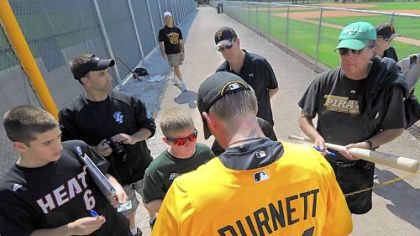 As a newcomer to Pirate City, A.J. Burnett is a popular autograph target Tuesday.