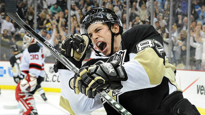 Sidney Crosby celebrates after scoring a goal in the third period Sunday against the Devils at Consol Energy Center.