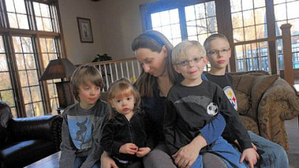 Charissa Pacella, ER chief at UPMC Presbyerian, with her kids, from left, Nicholas, 9, Michaela, 2, Gabriel, 5, and Justin, 10, at her Bethel Park home. She treated shooting victims Thursday.