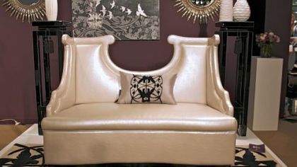 High sculpted back settee in pearl finish from Priscilla Presley Home Collection.