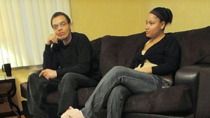 Matthew and Christine Heckter are seen here with their daughter, Annie Marie, at their home in McKees Rocks. The Heckters are concerned about how they will meet the terms of a lease-to-own contract on their home.