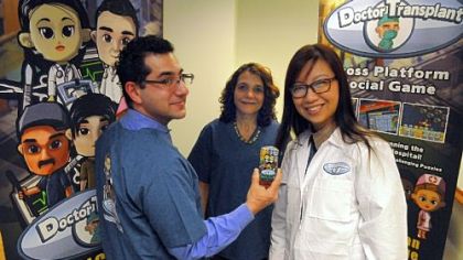 The Doctor Transplant team: from left, Howard Degenholtz and Abby Resnick, project director, both with the University of Pittsburgh; and Geraldine Yong, CEO of MogiMe, which helped to design the game.