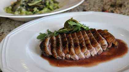At Stagioni on the South Side: Seared duck breast, front, and cavatelli with ramp pesto, prosciutto and oyster mushrooms. At Stagioni on the South Side: Seared duck breast, front, and cavatelli with ramp pesto, prosciutto and oyster mushrooms.
