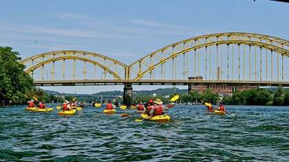 A group of kayakers explore the Three Rivers during Venture Outdoors annual Pedal, Paddle, Peduto event.