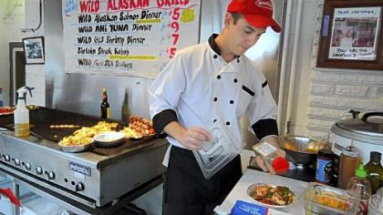 Luke Wholey at his old grill in the Strip District.