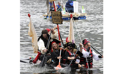 Despite taking on water, the Leaky Pearl Pirate float, sailed by a group of friends from Mt. Lebanon, took second place in the Anything That Floats Race on the Allegheny River during last year's Three Rivers Regatta.