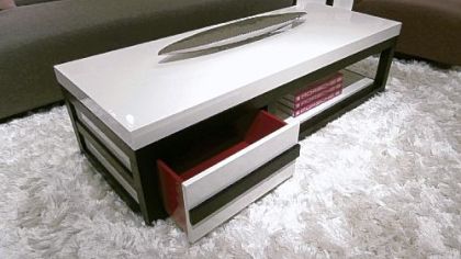 Mitchell Gold   Bob Williams introduced the Westwood Collection using high-gloss white lacquer trimmed in open-grain solid ash with an ebony finish.