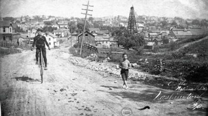 Frank Lenz rides a high-wheel bicycle in Washington, Pa., circa 1890. In 1892, he embarked from Pittsburgh on a round-the world bicycle trip but disappeared in Turkey.