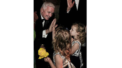 Gov. Tom Corbett greets  Zoe Bitz, left, and  Agnes Bitz during the reception before dinner at the Pittsburgh Opera benefit gala.