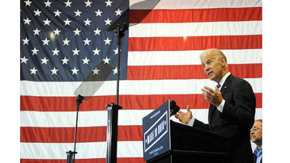 Biden rips Romney's business background in Youngstown