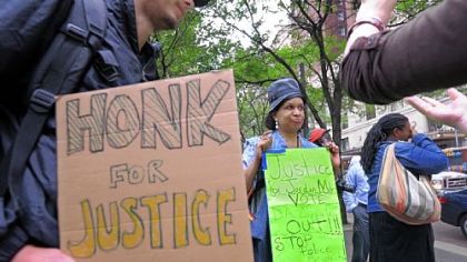The Alliance for Police Accountability held a rally during rush hour on the corner of Grant Street and Avenue Downtown to protest DA Stephen Zapalla's decision not to prosecute the city police officers involved in the beating of Jordan Miles.