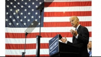Biden rips Romney's business background in Youngstown