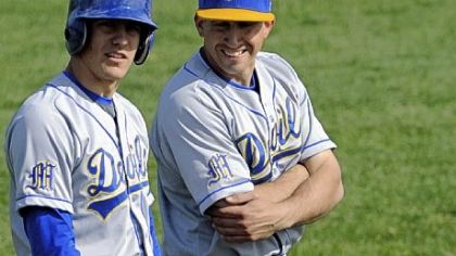Senior outfielder Luke Hagy, left, confers with Mt. Lebanon coach Pat McCloskey during a game earlier this season.