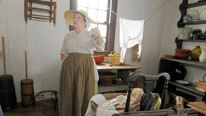 Volunteer Erin Windhorst describes the process of doing laundry in the late 1700s at Woodville Plantation.