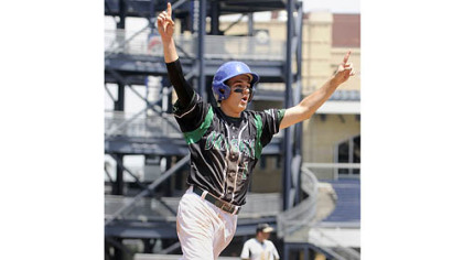 Allderdice's Braden Hoffer celebrates after scoring the go-ahead run against Brashear in the seventh inning of the City League baseball championship Thursday at PNC Park.