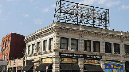 The billboard atop the Waffle Shop on Highland Avenue in East Liberty.