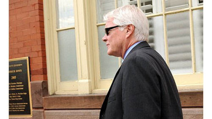 Prosecutor Joe McGettigan leaves the Centre County Courthouse Annex in Bellefonte, Pa., Tuesday. Jerry Sandusky attended a closed-door meeting with the judge in his child sexual abuse case.