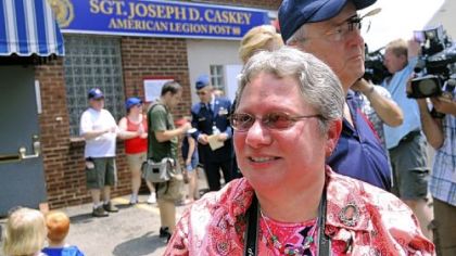 Debbie Caskey greets friends outside American Legion Post 80 in Ross after the dedication ceremony naming the post after her son, Sgt. Joseph D. Caskey, who was killed in action in June 2010 in Afghanistan.