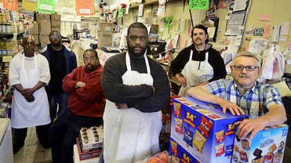 Larry Turner, Lorrenzo Strozier, Al Strozier, Walt Andrews, Dave Kennedy and owner Louis Greenwald at Bell's Market in Braddock.