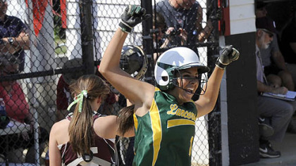 Deer Lakes' Becca Babincak celebrates after scoring the winning run against Greensburg Central Catholic in the WPIAL Class AA title game Thursday at California University.