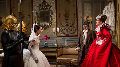 From left, Lily Collins, Nathan Lane and Julia Roberts star in 'Mirror Mirror.'