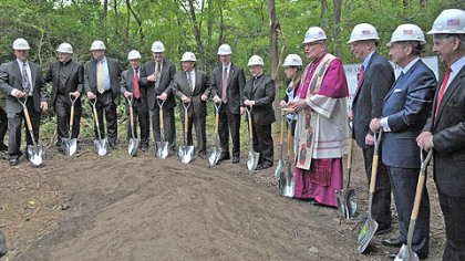 Bishop David A. Zubik leads school personnel and contractors today as they prepare to break ground for the new Cardinal Wuerl North Catholic High School in Cranberry Township.