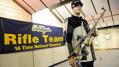 West Virginia coach Jon Hammond is a shooting advertisement for the Mountaineers program throughout the world.