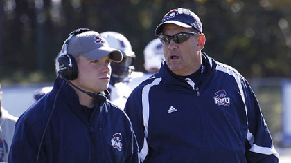 Camdin Crouse, left, on sidelines. He plans to return to coaching this fall after a life-changing accident in early May.