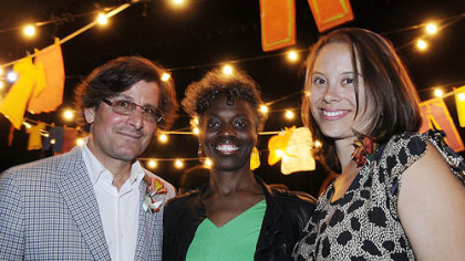 Chair Steve Mosites flank executive director Janera Solomon and chair Gail Mosites.
