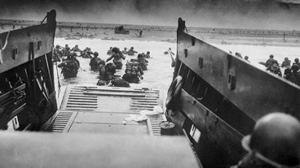 Troops wade ashore in Normandy, France, on June 6, 1944.