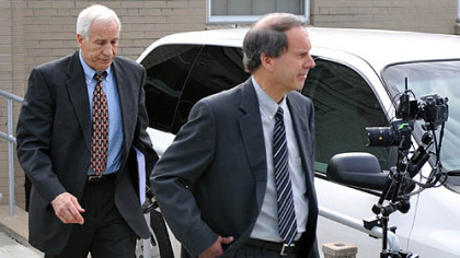 Jerry Sandusky and his attorney, Joe Amendola, leave the Centre County Courthouse after the first day of jury selection for Mr. Sandusky's trial.