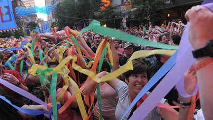 Ribbons cover the crowd at the Pride in the Street party on Liberty Ave., Downtown.