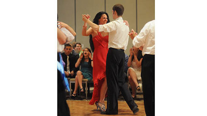 Adam Glatz and Victoria Berdnik, representing Lamar Advertising.