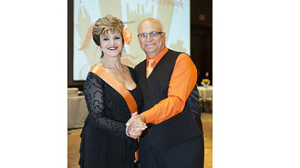 Jane and Bob Bukk, Team Orange, representing Tobacco Free Allegheny. Although this was Jane and Bob's first Mad Hot Ballroom Pittsburgh grand championship win, it marked the second time Team Orange and Tobacco Free Allegheny took top honors at the event.