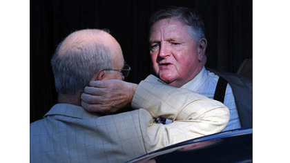 John McQueary, father of former Penn State football coach Mike McQueary, leaves the Centre County Courthouse today.