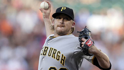 Pirates starting pitcher Kevin Correia throws to the Orioles in the first inning.